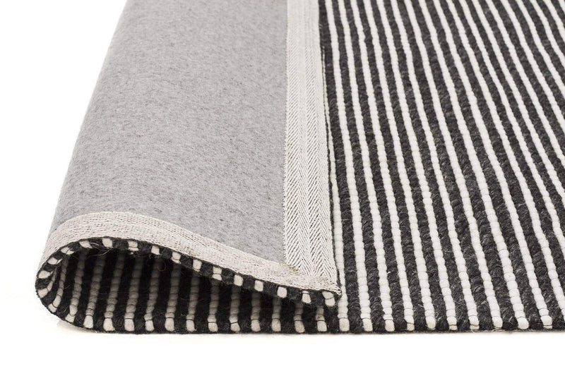 Studio-Oskar Felted Wool Striped Rug Black White